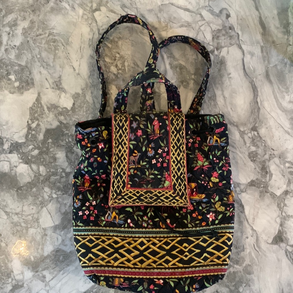 Vera Bradley quilted fabric backpack, gently used. Measures approx: 12”x12”x4”.
